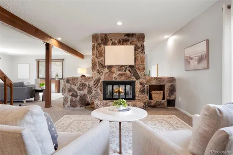a view of kitchen with livingroom and furniture