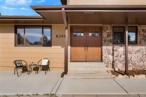 a living room with furniture and window