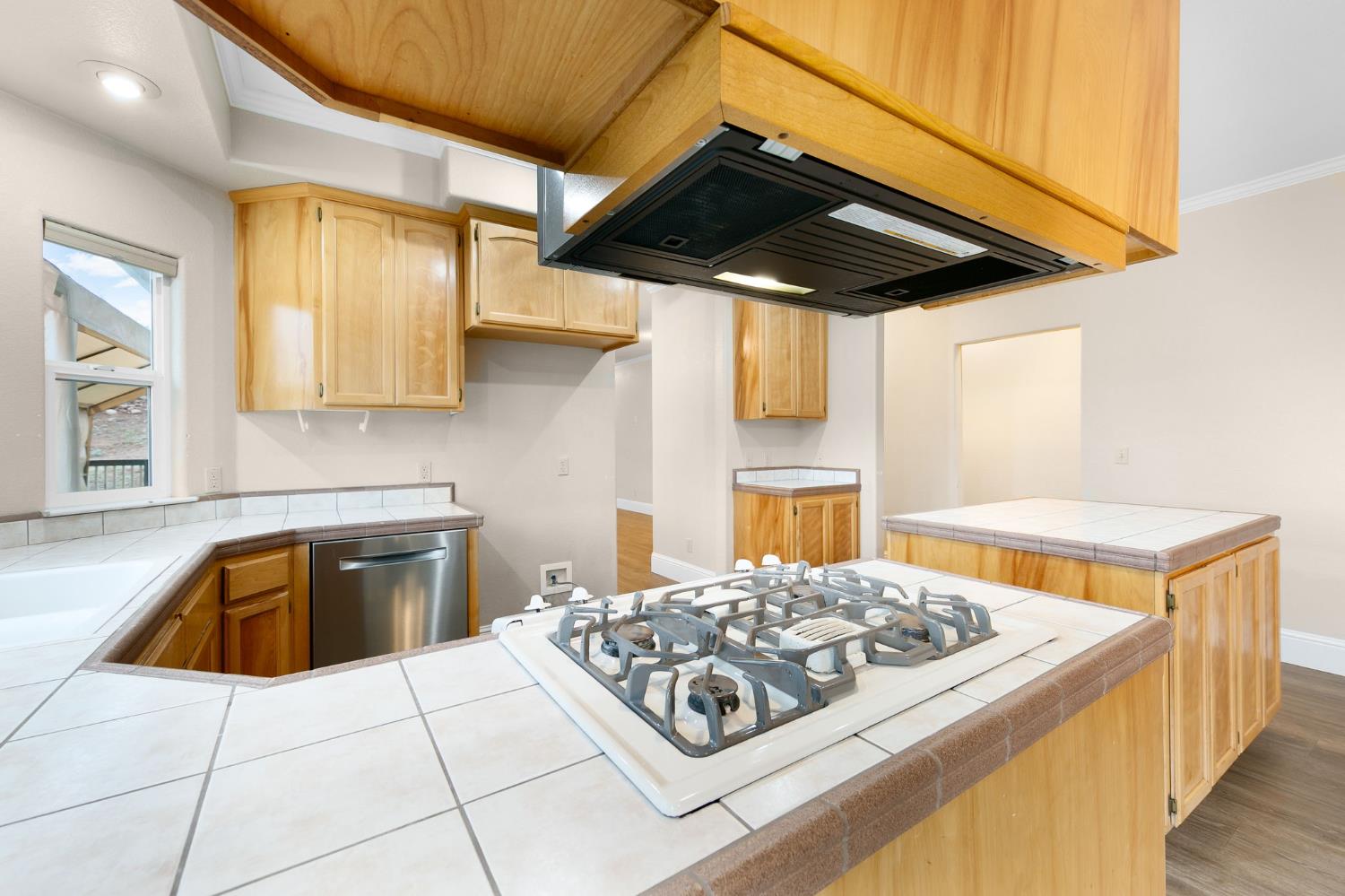 1261 Jurgens Road Rescue, CA 95672 - Photo 14 of 74 a kitchen with stainless steel appliances granite countertop a sink stove and cabinets