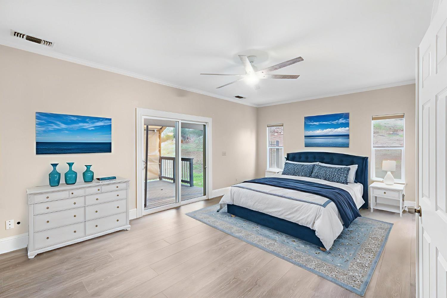 1261 Jurgens Road Rescue, CA 95672 - Photo 17 of 74 a spacious bedroom with a large bed and a window