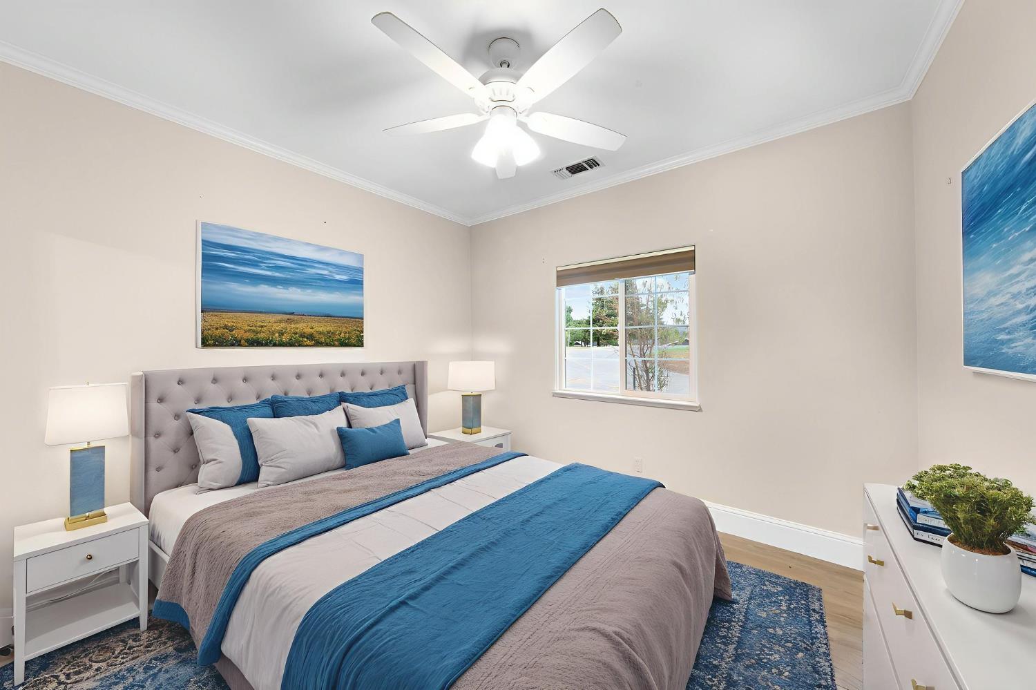 1261 Jurgens Road Rescue, CA 95672 - Photo 23 of 74 a bedroom with a large bed and a window