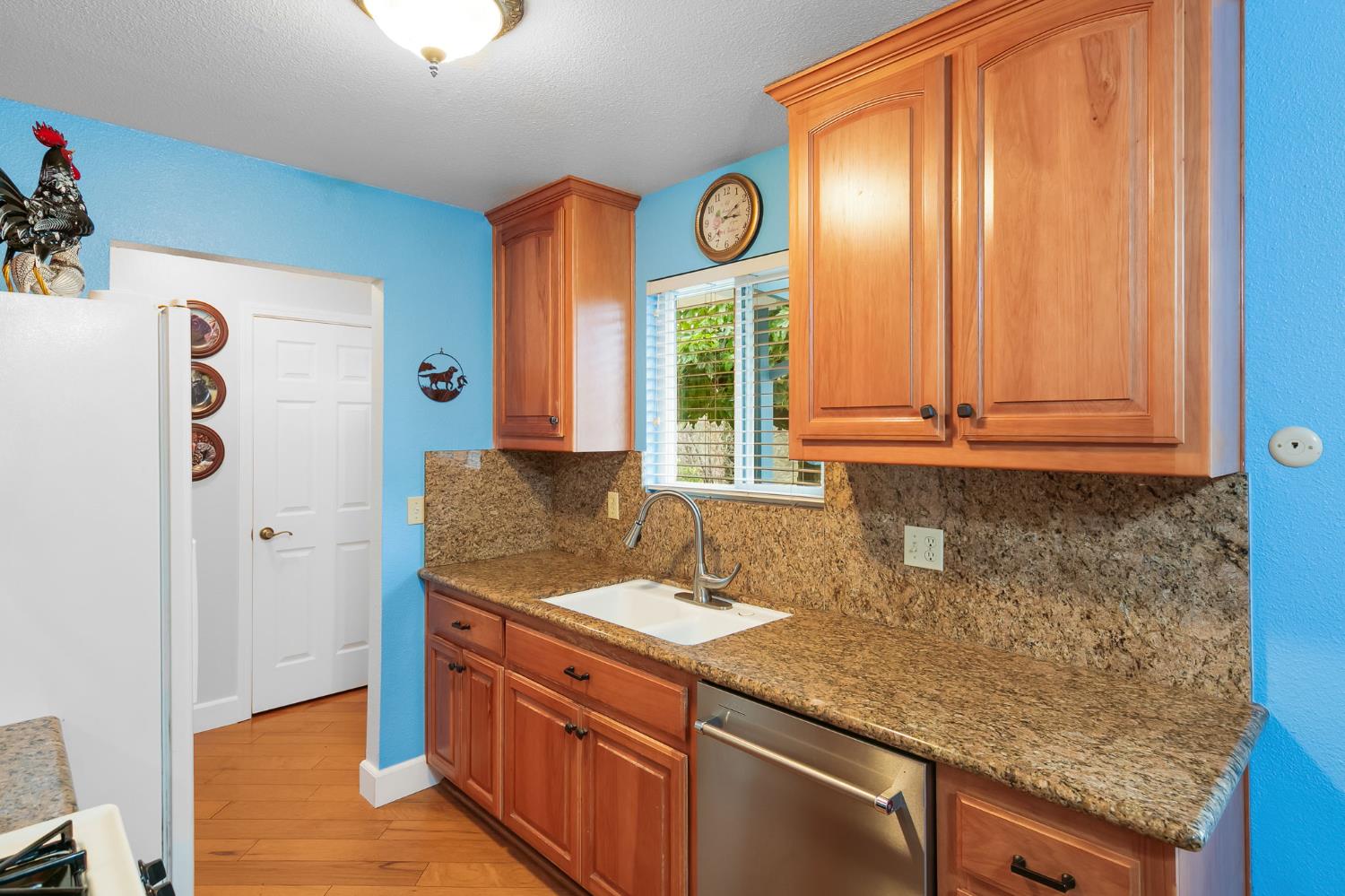 1261 Jurgens Road Rescue, CA 95672 - Photo 39 of 74 a bathroom with a granite countertop sink and a mirror