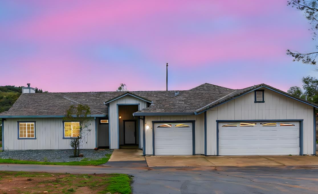 1261 Jurgens Road Rescue, CA 95672 - Photo 4 of 74 a front view of a house with garden