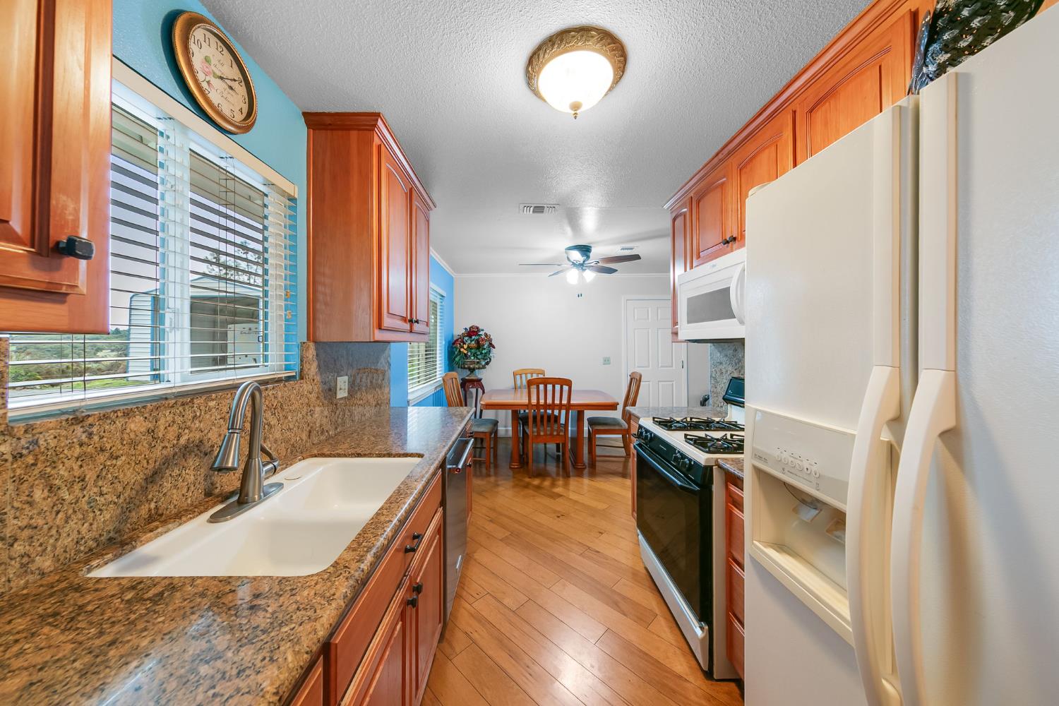 1261 Jurgens Road Rescue, CA 95672 - Photo 41 of 74 a kitchen with granite countertop lots of counter top space and stainless steel appliances