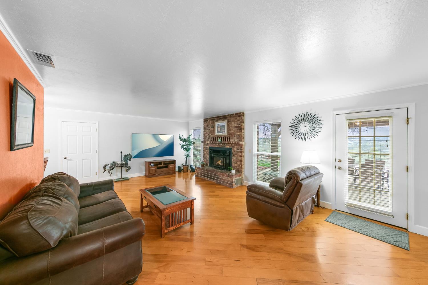 1261 Jurgens Road Rescue, CA 95672 - Photo 46 of 74 a living room with furniture and a wooden floor