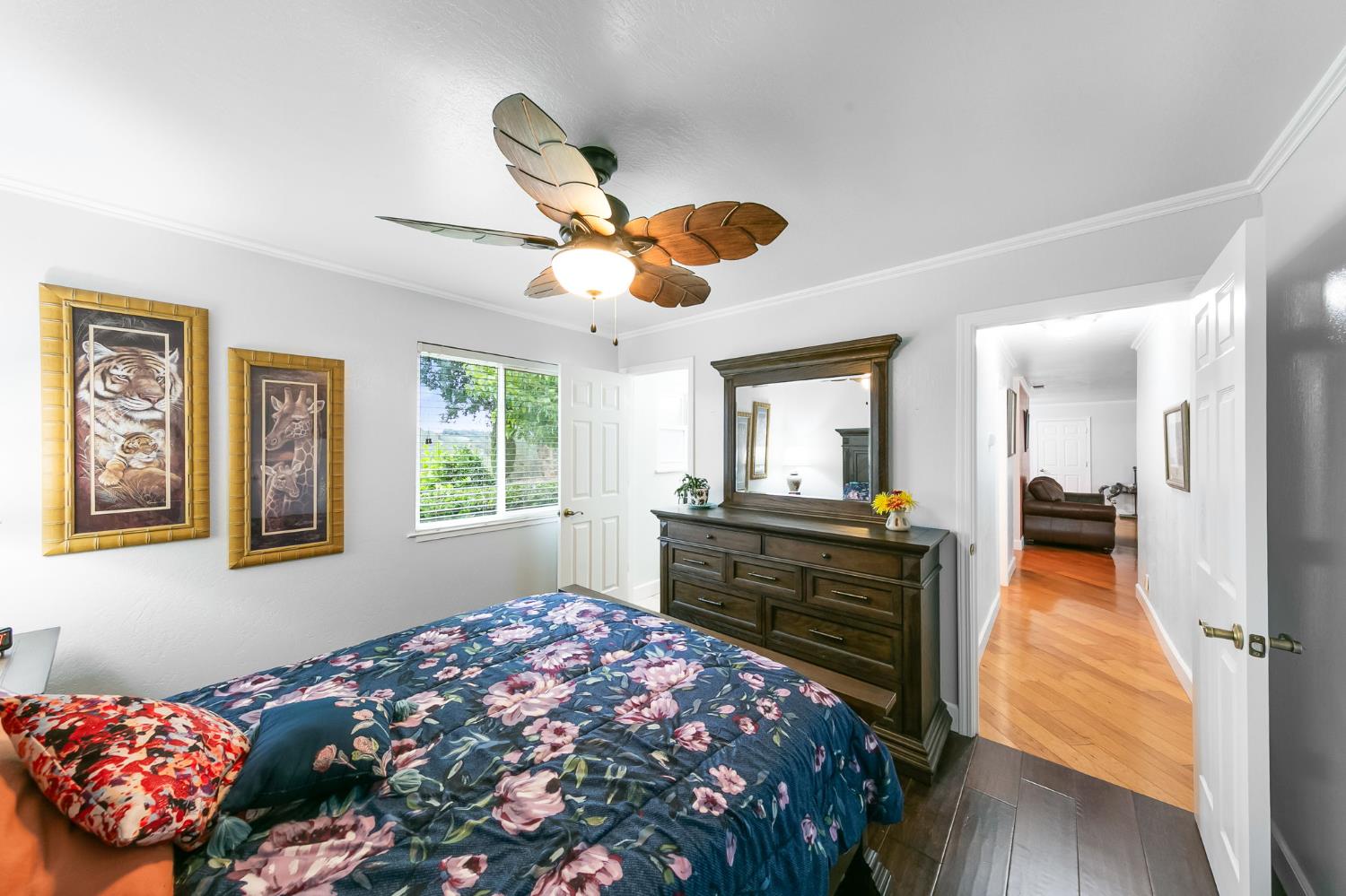 1261 Jurgens Road Rescue, CA 95672 - Photo 53 of 74 a bedroom with a bed and a chandelier