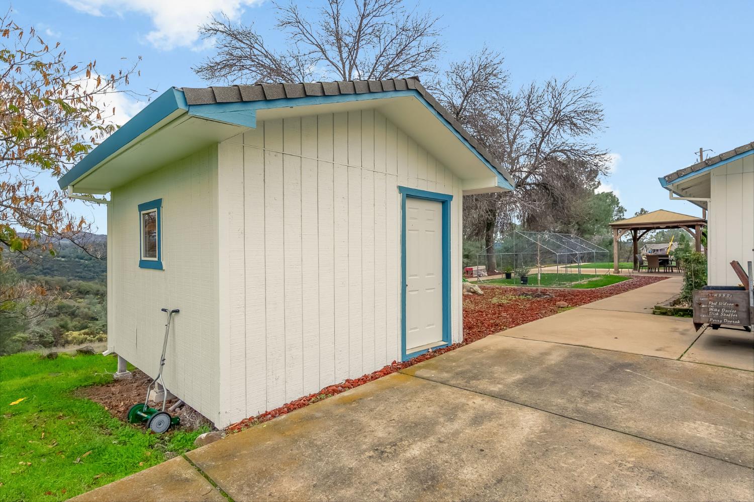 1261 Jurgens Road Rescue, CA 95672 - Photo 65 of 74 a view of a house with backyard and trees