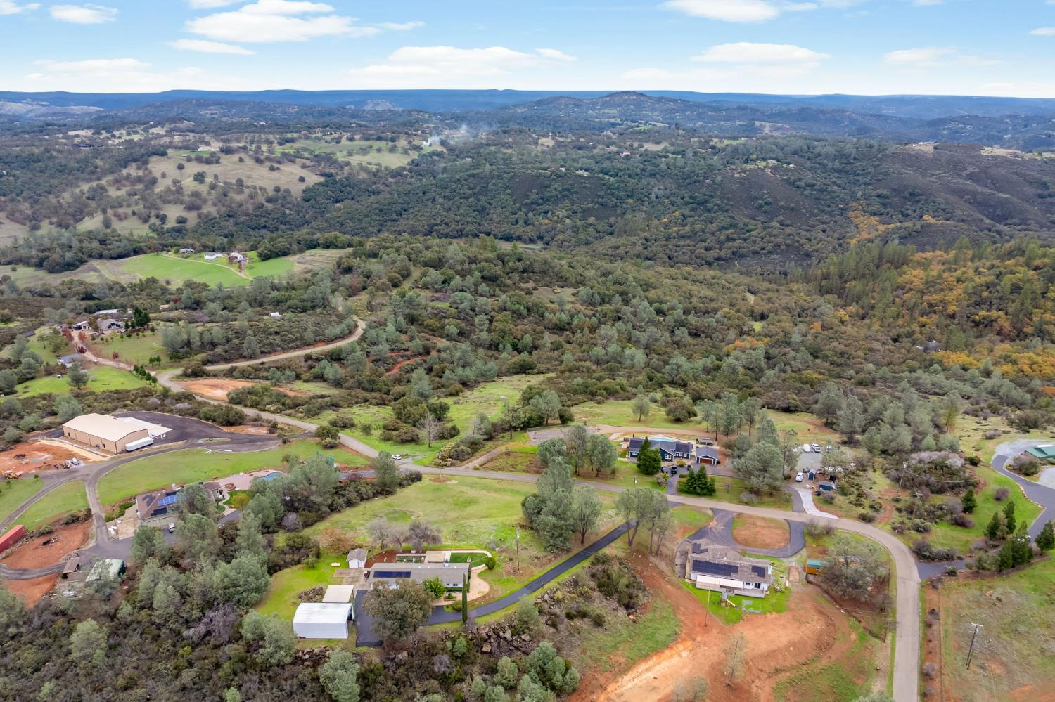 1261 Jurgens Road Rescue, CA 95672 - Photo 68 of 74 an aerial view of residential houses with outdoor space