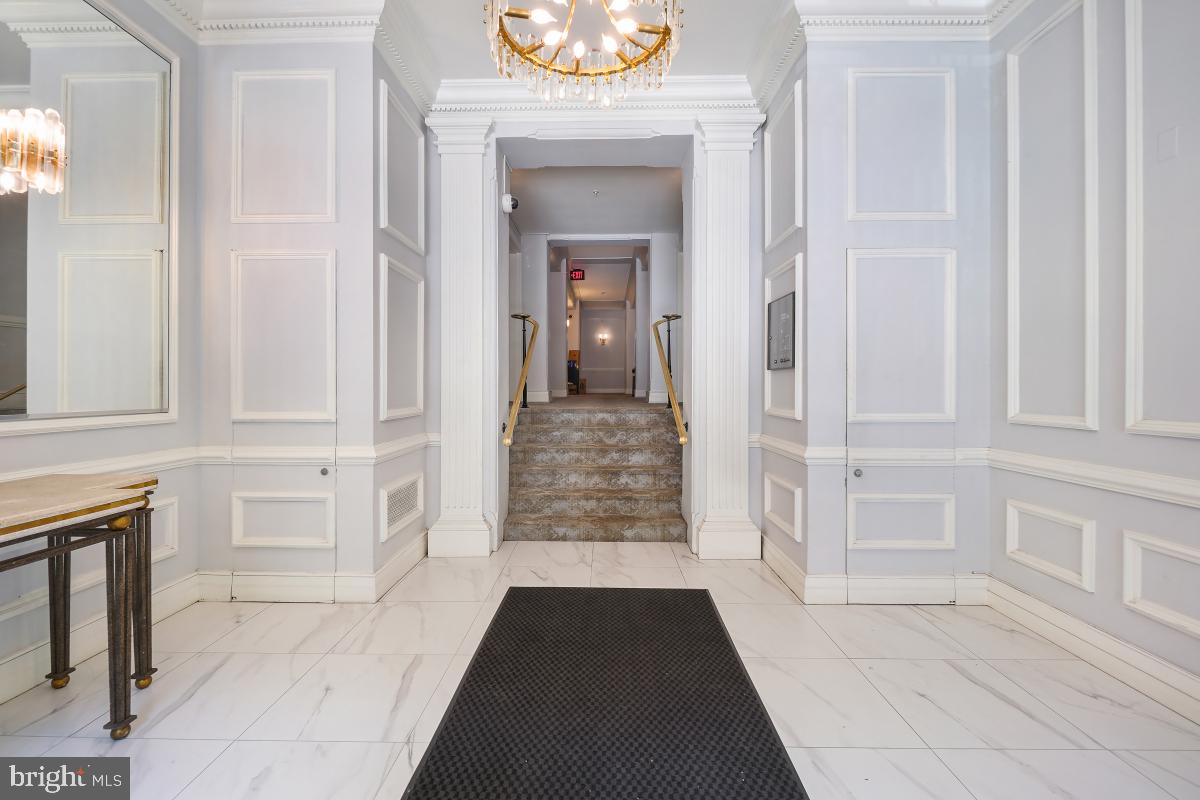 1619 R Street Northwest, Unit 602 Washington, DC 20009 - Photo 4 of 35 a view of a hallway view with staircase