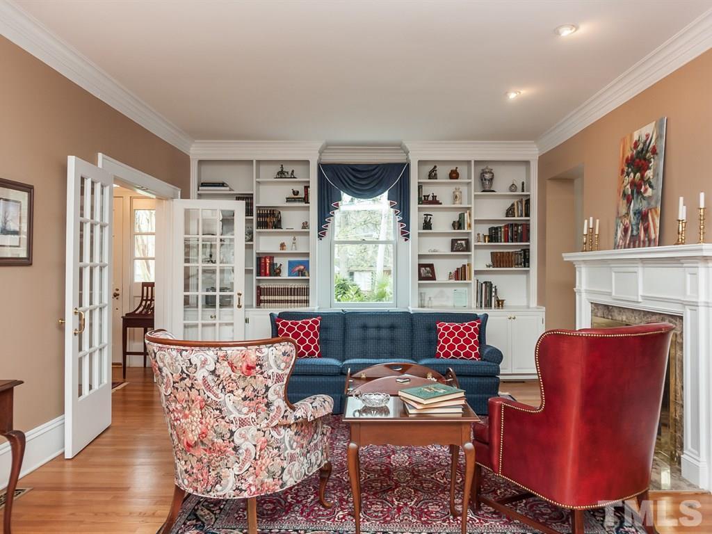 2025 St Marys Street Raleigh, NC 27608 - Photo 5 of 25 a living room with furniture window and wooden floor