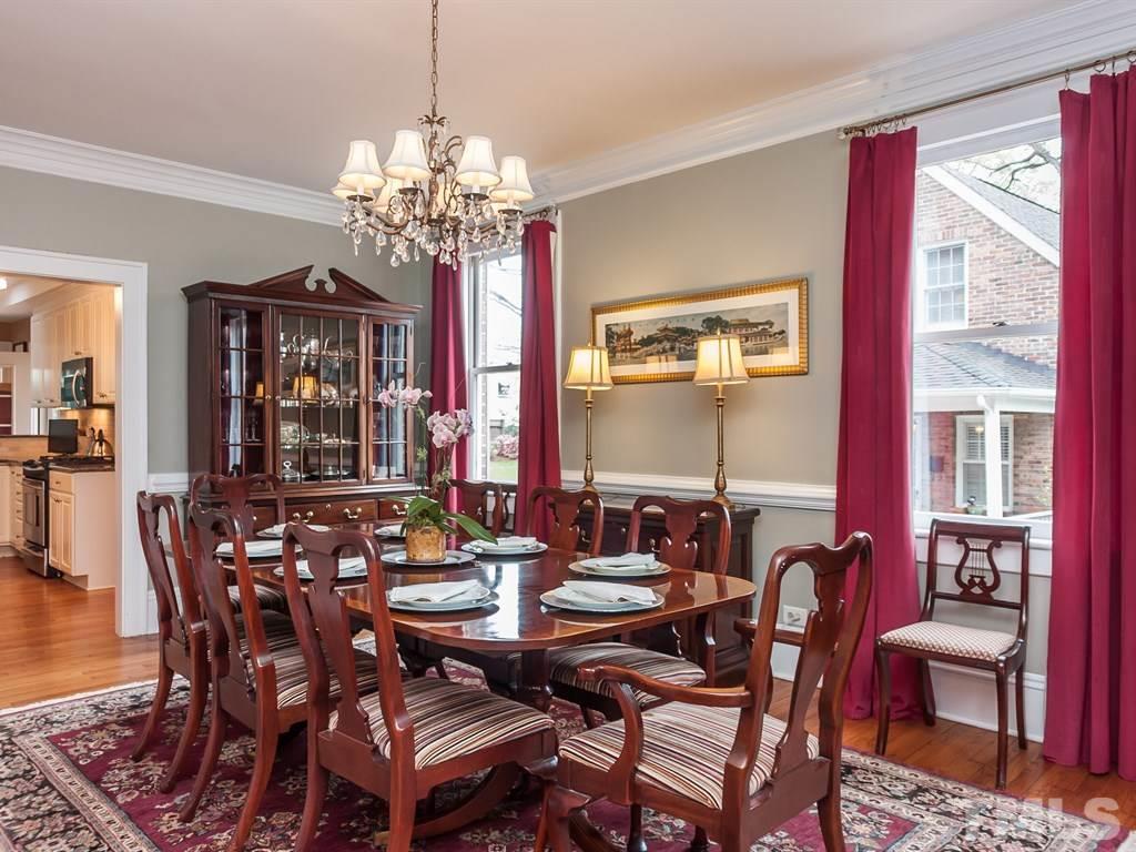 2025 St Marys Street Raleigh, NC 27608 - Photo 6 of 25 a view of a dining room with furniture window and wooden floor