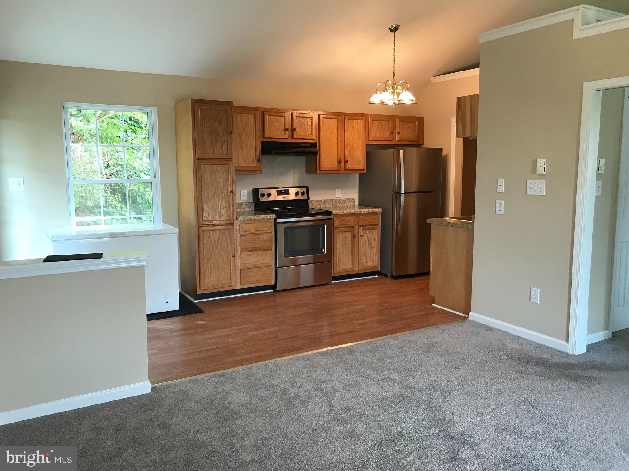 706 Frederick Street Reading, PA 19607 - Photo 5 of 41 In-law suite kitchen view from living area