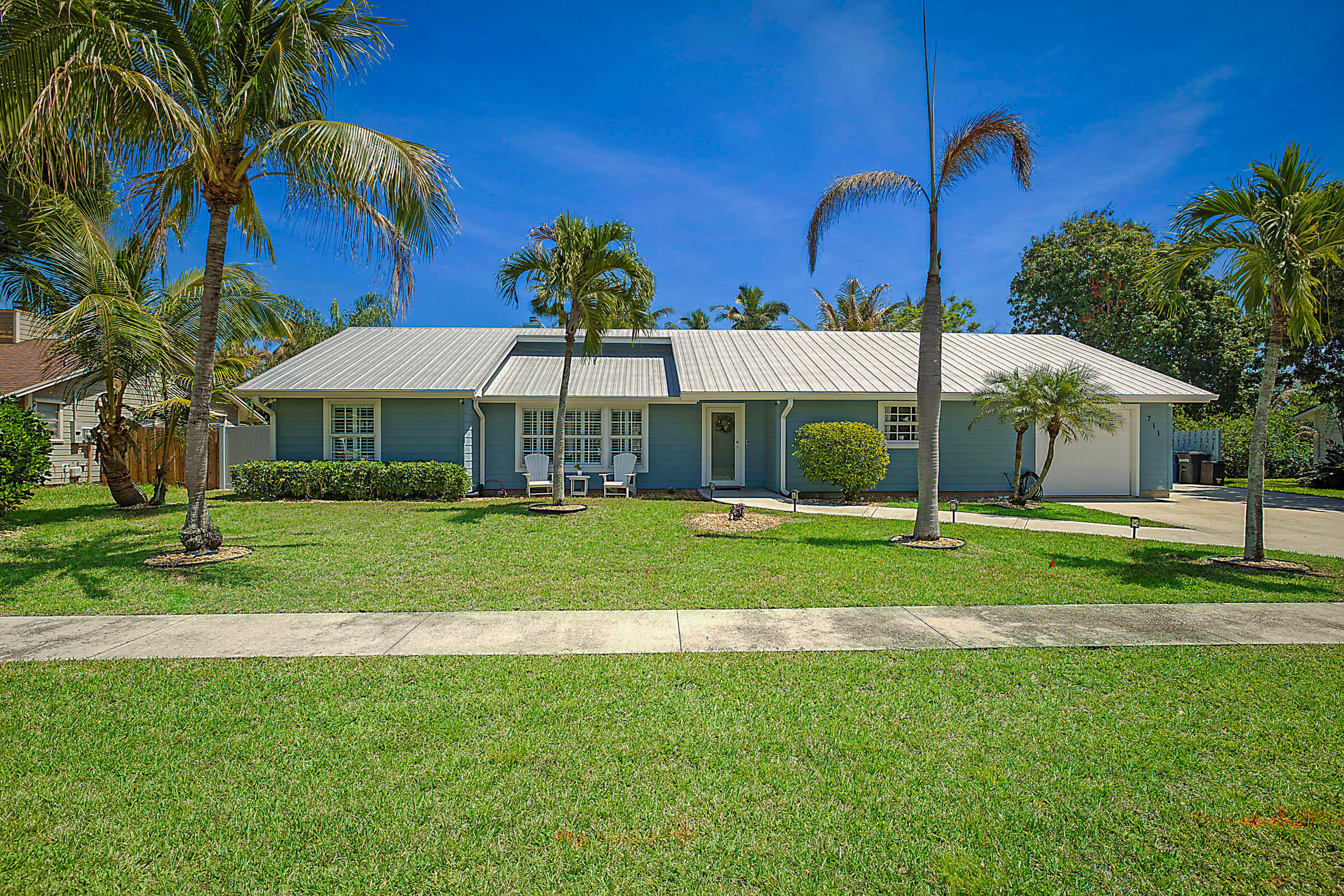 711 Warren Drive Jupiter, FL 33458 - Photo 1 of 42 Front Elevation