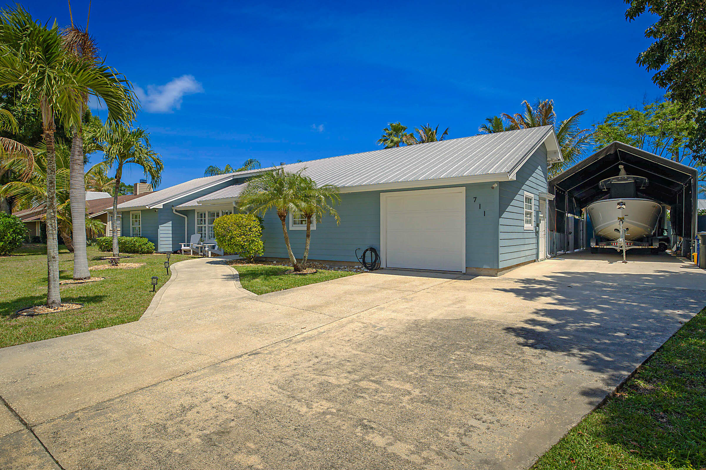 711 Warren Drive Jupiter, FL 33458 - Photo 2 of 42 Front Elevation
