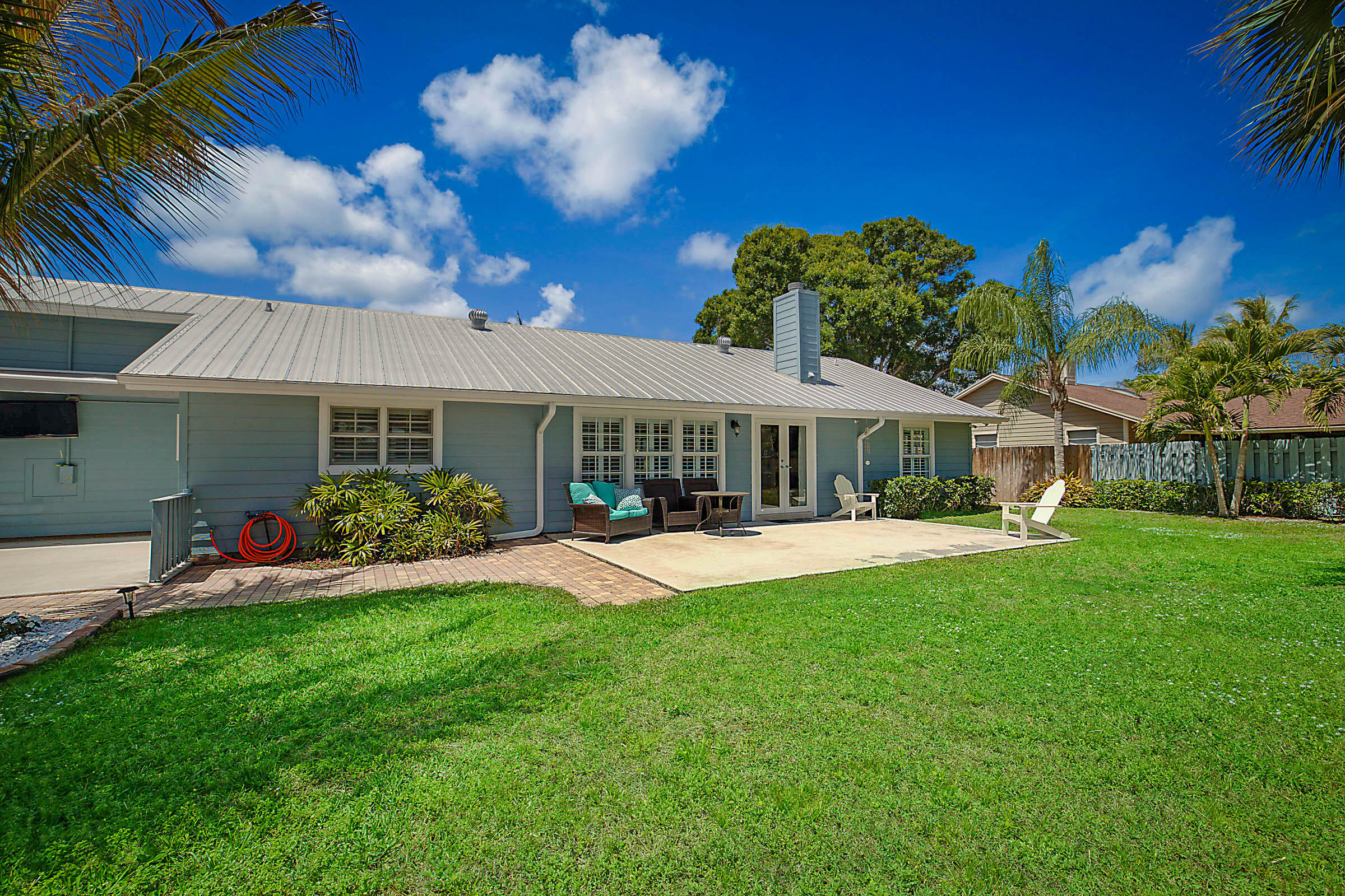 711 Warren Drive Jupiter, FL 33458 - Photo 31 of 42 Rear Elevation