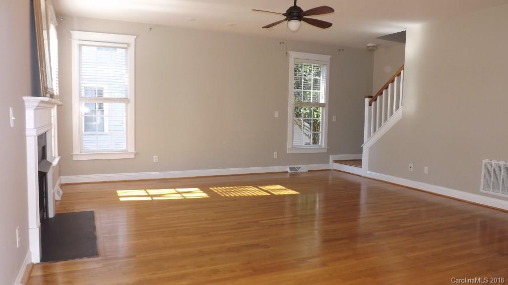 537 Glen Walk Drive Fort Mill, SC 29708 - Photo 11 of 19 a view of an empty room with window and wooden floor