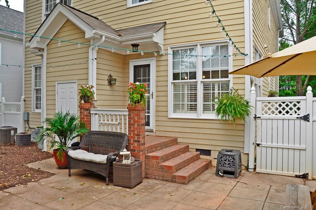 537 Glen Walk Drive Fort Mill, SC 29708 - Photo 18 of 19 a view of a patio with couches chairs and potted plants