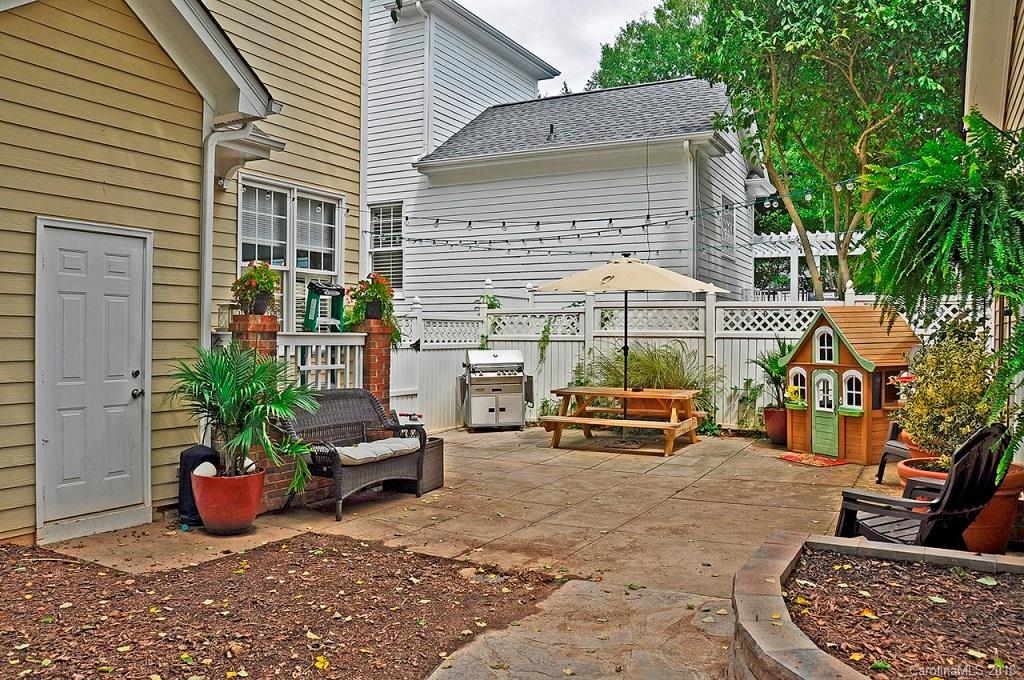 537 Glen Walk Drive Fort Mill, SC 29708 - Photo 19 of 19 a view of a patio with couple of chairs and potted plants