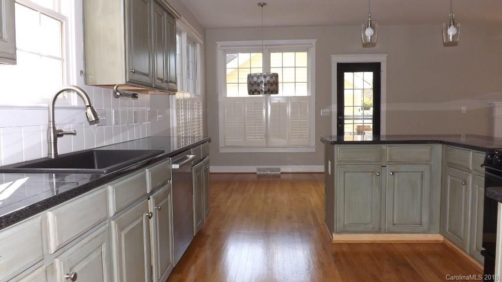 537 Glen Walk Drive Fort Mill, SC 29708 - Photo 6 of 19 a kitchen with granite countertop a sink and cabinets