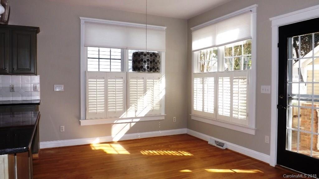 537 Glen Walk Drive Fort Mill, SC 29708 - Photo 7 of 19 a view of an empty room with a window and a kitchen