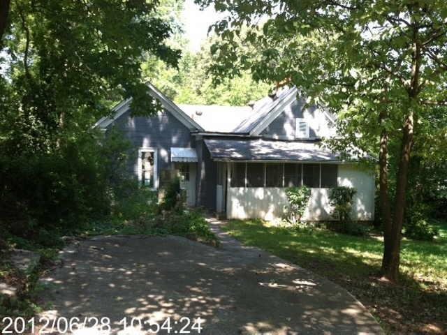 1726 Oakview Road Northeast Decatur, GA 30030 - Photo 1 of 1 a front view of a house with garden