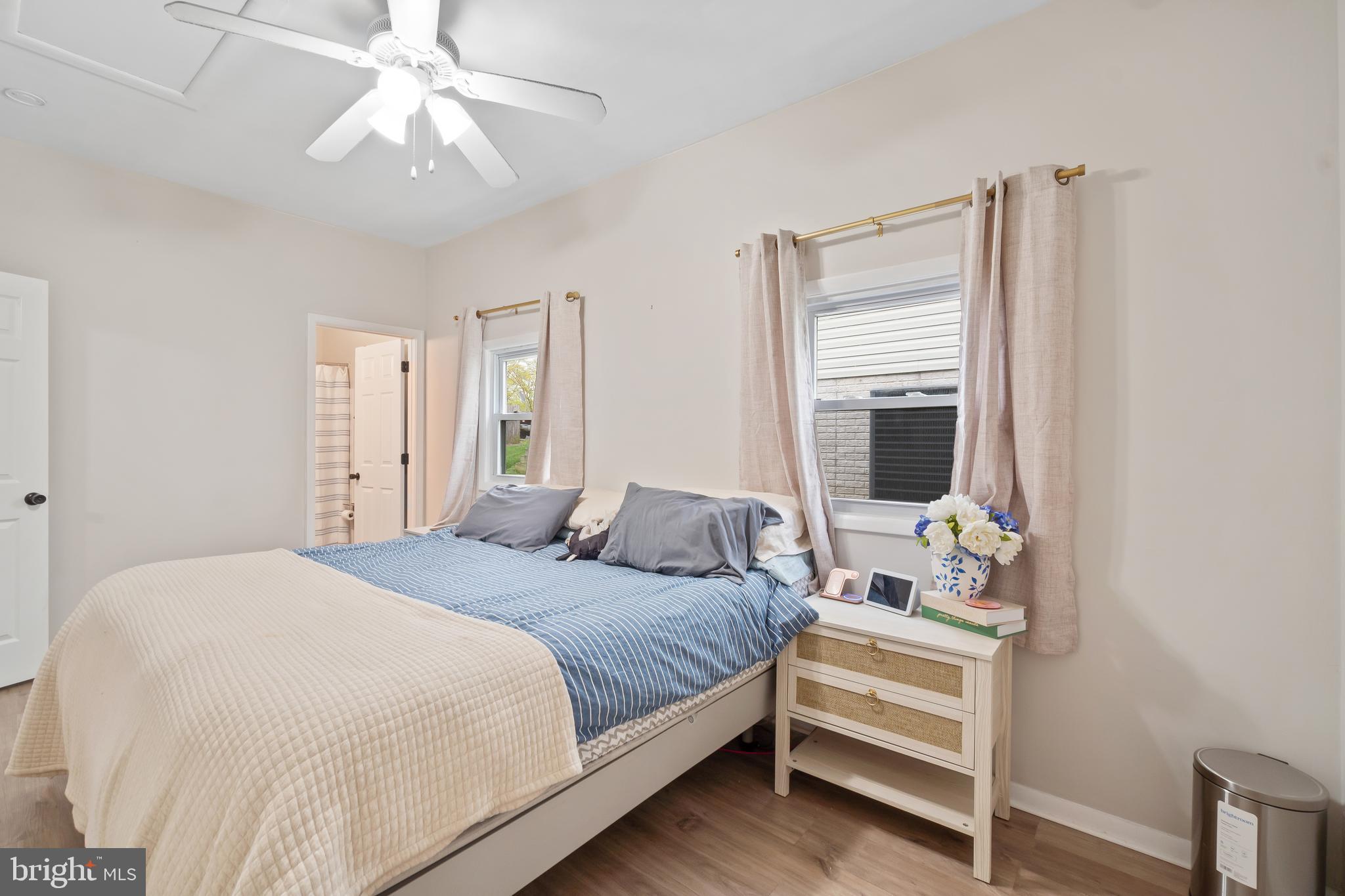 5 Dogwood Road Riva, MD 21140 - Photo 17 of 40 a bedroom with a bed and a chandelier