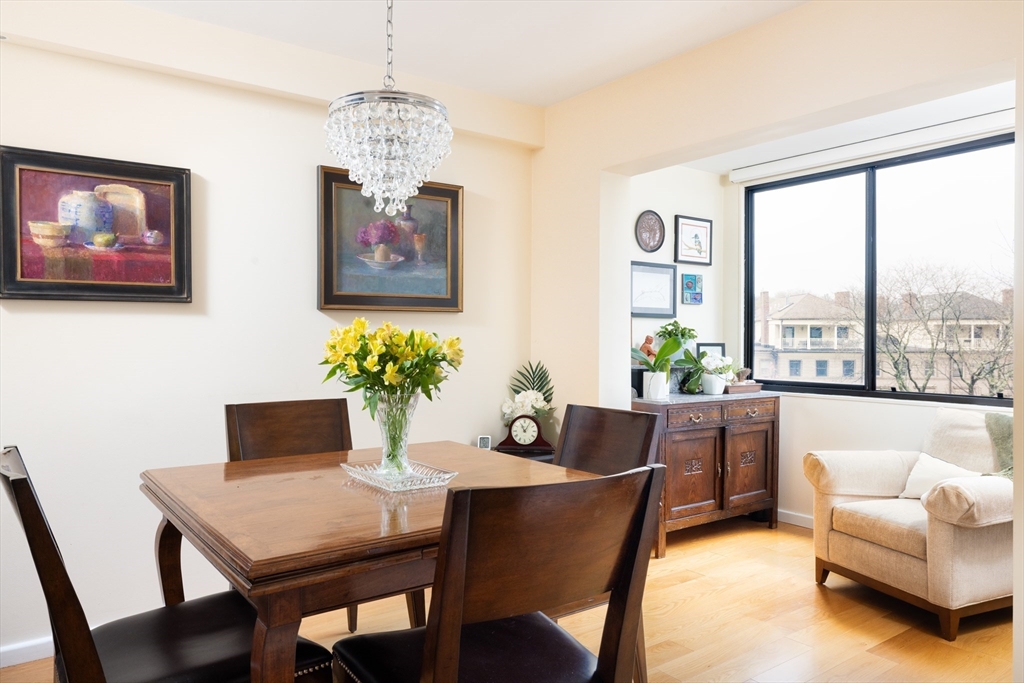 1731 Beacon Street, Unit 402 Brookline, MA 02445 - Photo 5 of 14 a dining room with furniture and window