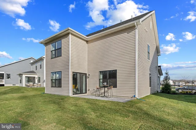 a sign that is sitting on the grass