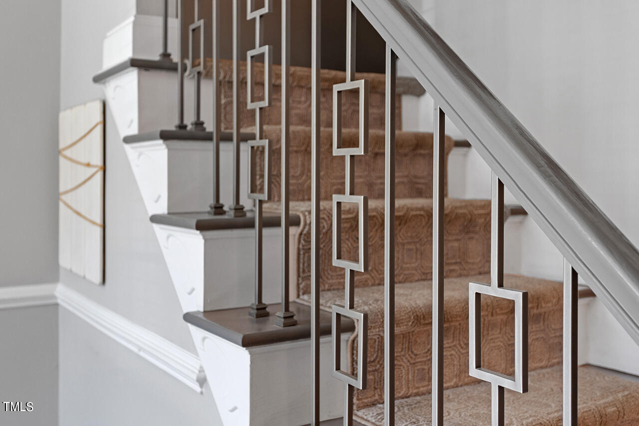 10145 Mizner Lane Raleigh, NC 27617 - Photo 8 of 61 New custom staircase balusters leading to second floor
