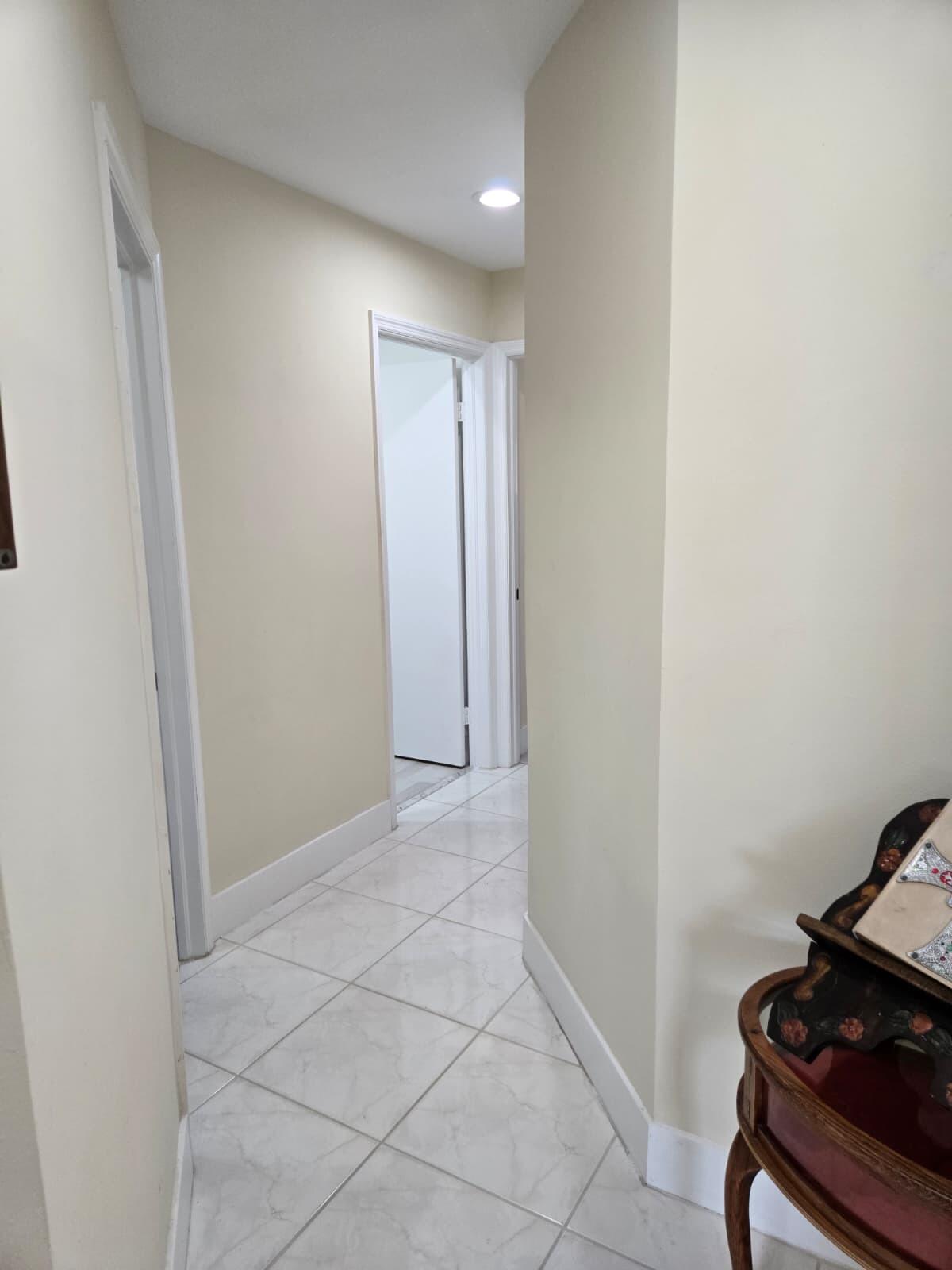 10870 Lakemore Lane, Unit 201 Boca Raton, FL 33498 - Photo 18 of 26 a view of room with cabinets