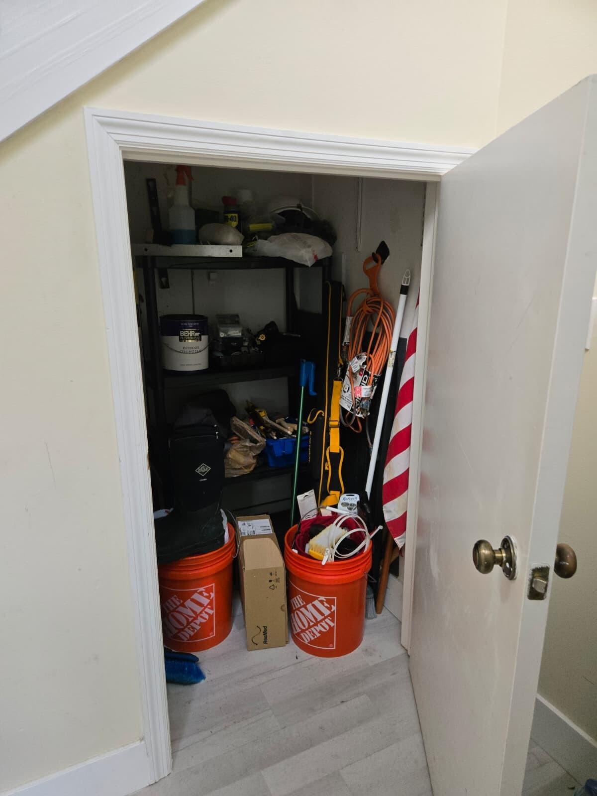 10870 Lakemore Lane, Unit 201 Boca Raton, FL 33498 - Photo 25 of 26 a room with lots of different colored cloths