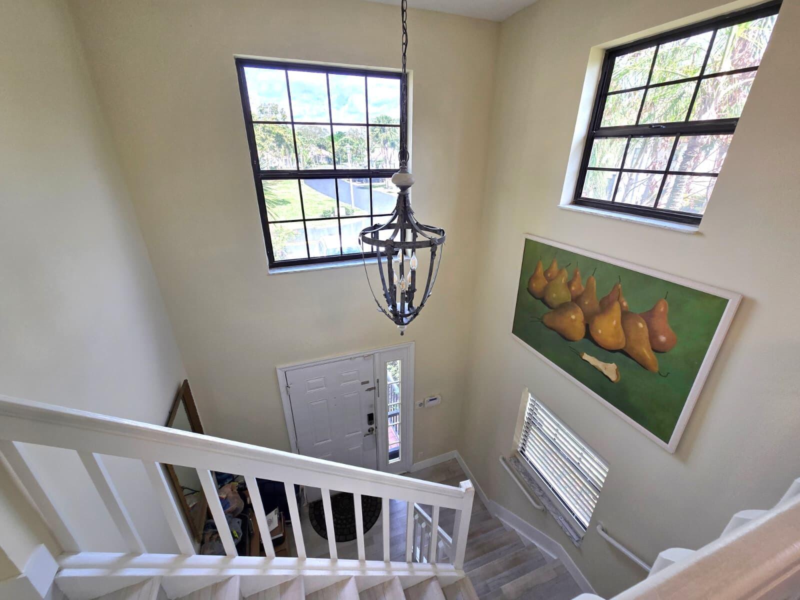 10870 Lakemore Lane, Unit 201 Boca Raton, FL 33498 - Photo 4 of 26 a bedroom with a bed and a window