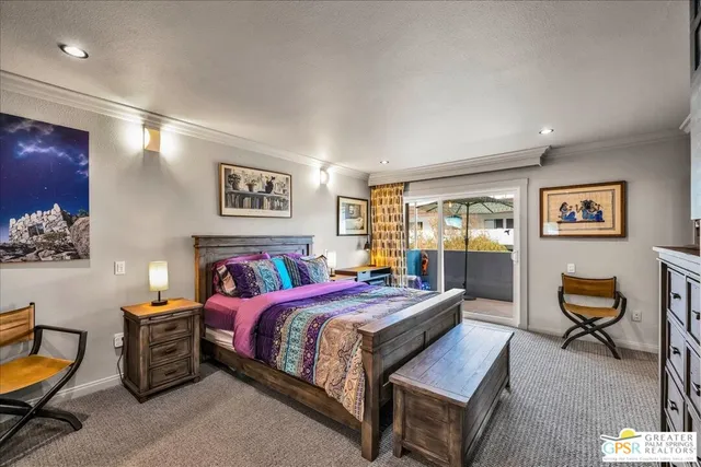 a bedroom with a bed and furniture