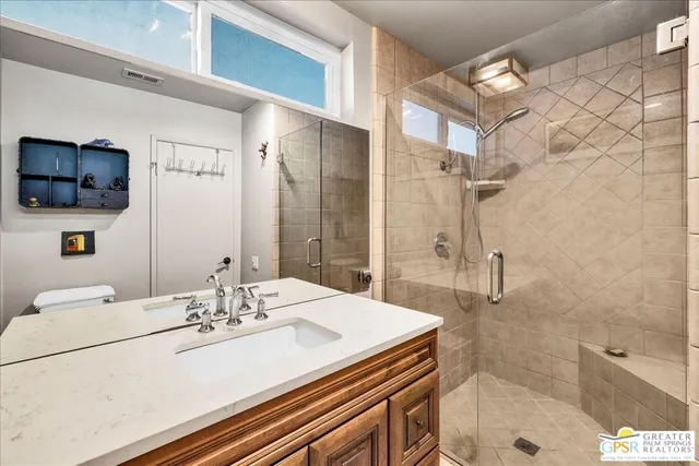 a bed room with a bed and a couch