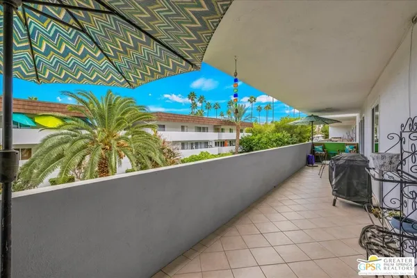 a view of a porch with seating space