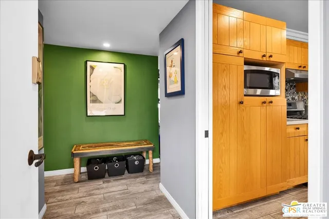 a view of living room with furniture and window