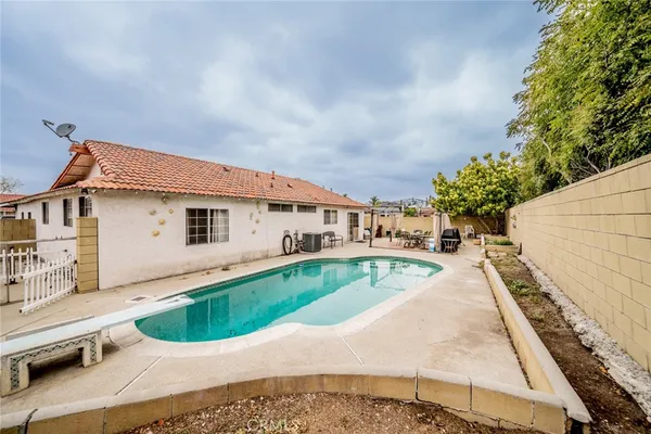 a view of a house with a swimming pool