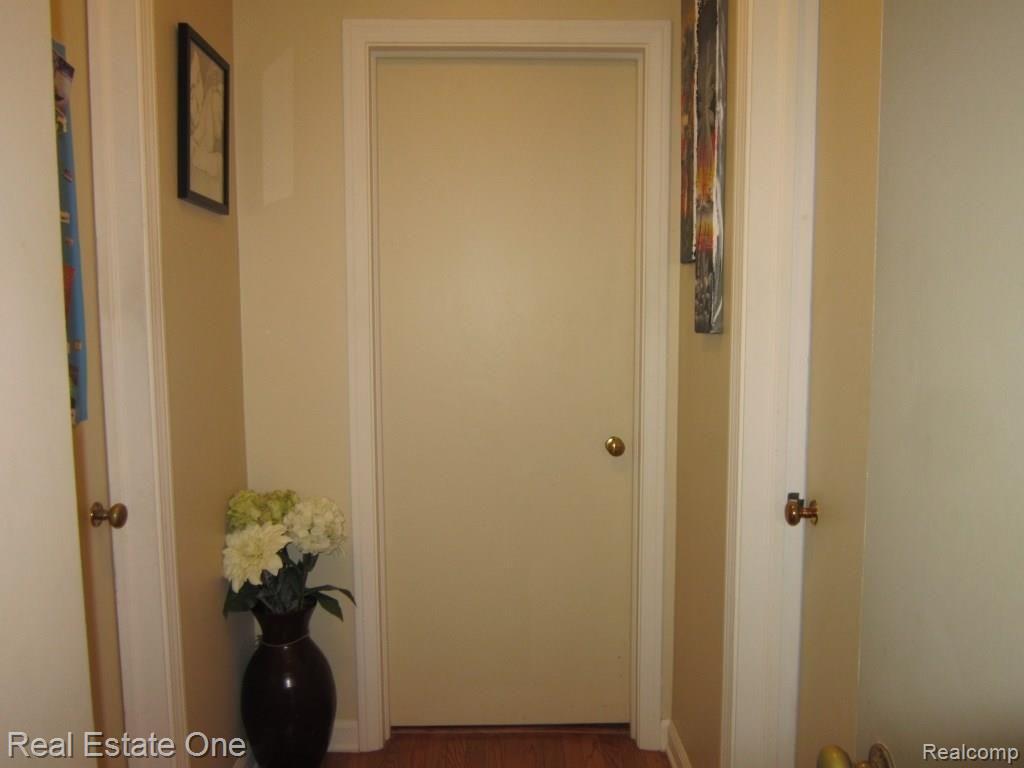 335 Maple Street Howell, MI 48843 - Photo 16 of 47 hall to bedrooms