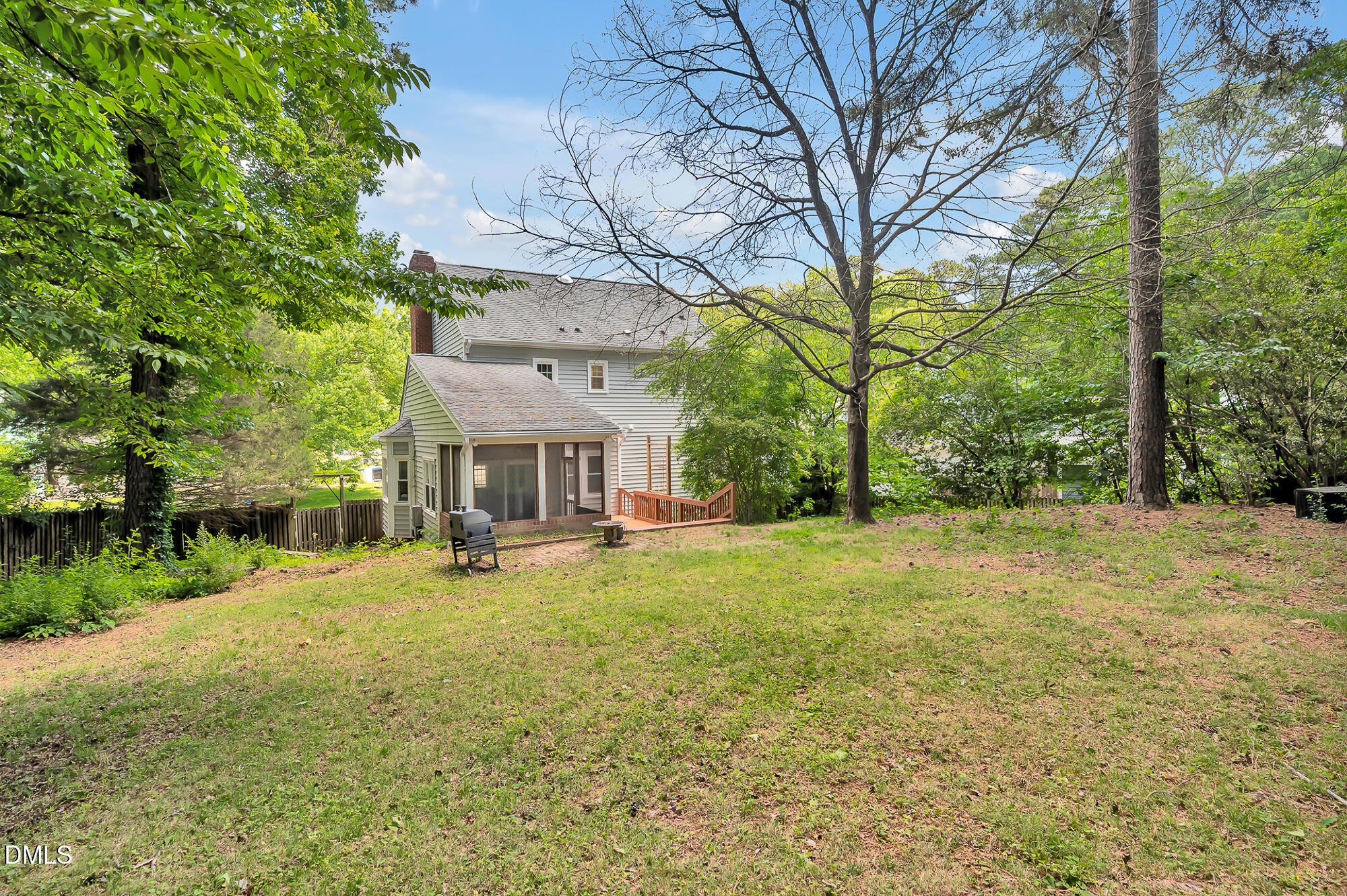 7500 Drayton Court Raleigh, NC 27615 - Photo 23 of 27 a view of a house with backyard and sitting area