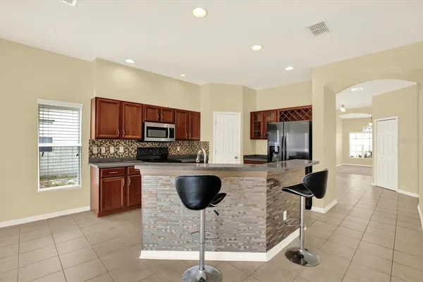 a view of a kitchen with a sink