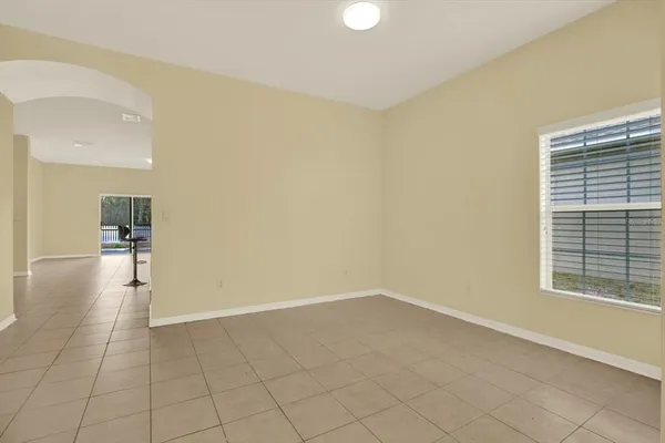 a kitchen with granite countertop a stove and a microwave oven