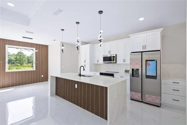 $392,000 | 218 Irving Avenue, Lehigh Acres, FL 33936