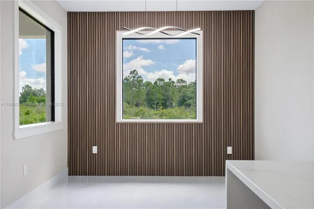 $392,000 | 218 Irving Avenue, Lehigh Acres, FL 33936