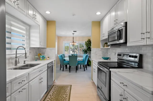 $590,000 | 5143 Southeast Club Way, Stuart, FL 34997