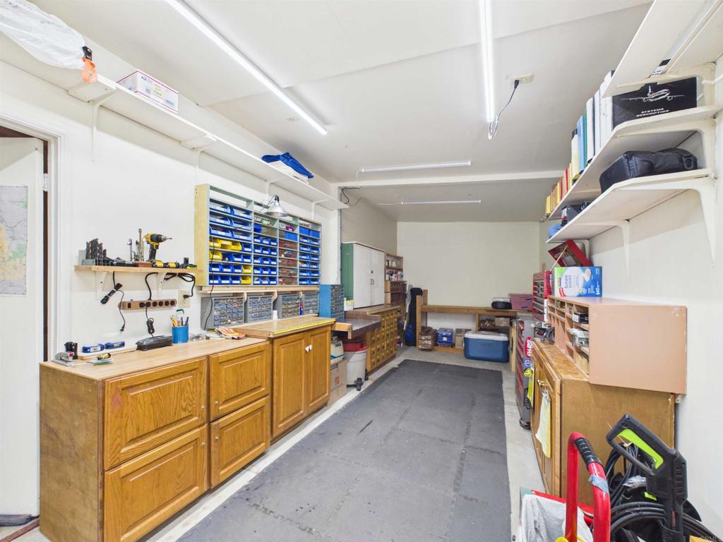 18218 Paradise Mountain Road, Unit 220 Valley Center, CA 92082 - Photo 45 of 48 a storage & utility room with a lot of cabinets