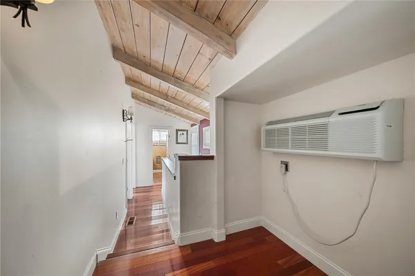a view of entryway with wooden floor