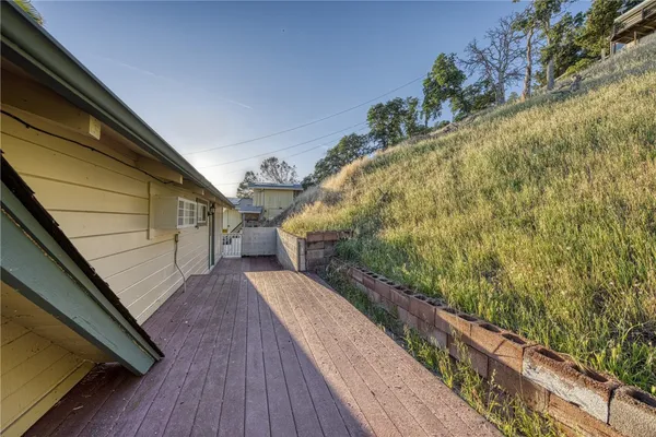a view of balcony and wooden floor