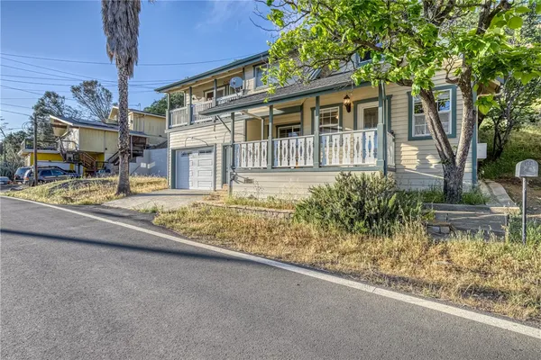 a view of a house with a street