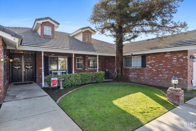 a view of a lobby with table and chairs