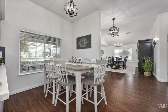 a living room with furniture a window and a fireplace